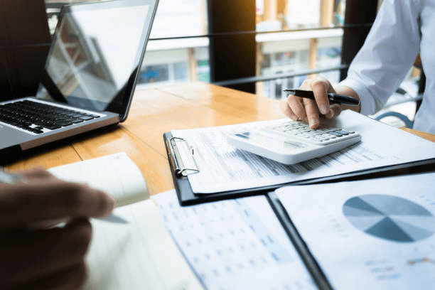 Audit documents and financial records on a desk